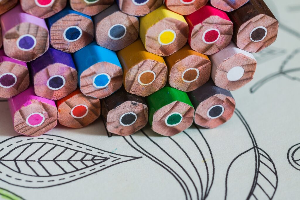 What benefits do coloring books for adults have?